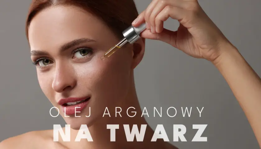 Kobieta aplikuje kroplę olejku arganowego do twarzy za pomocą pipety. Skóra promienieje blaskiem.